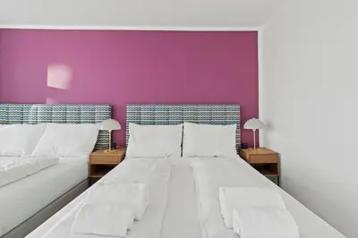 Ein Bett oder Betten in einem Zimmer der Unterkunft Cozy Living Apartment 