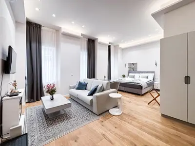 Ein Bett oder Betten in einem Zimmer der Unterkunft Apartment Grandeur in Vienna's City Center