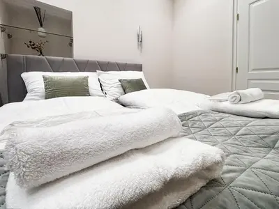 Ein Bett oder Betten in einem Zimmer der Unterkunft Apartment Grandeur in Vienna's City Center