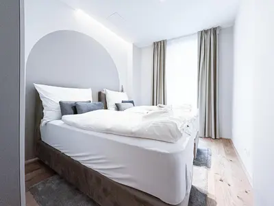 Ein Bett oder Betten in einem Zimmer der Unterkunft Apartment Charming in Vienna's City Center