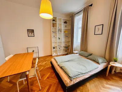 Ein Bett oder Betten in einem Zimmer der Unterkunft Small & fine apartment near AKH