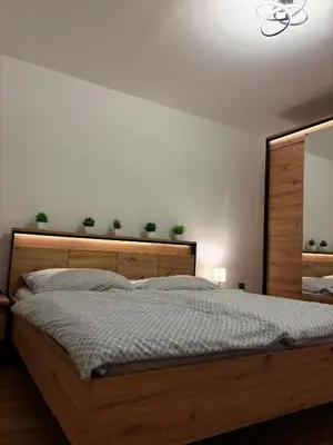 Ein Bett oder Betten in einem Zimmer der Unterkunft Vienna Near Lake Homes