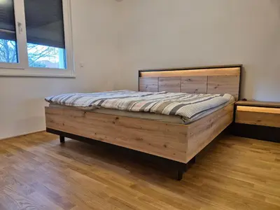 Ein Bett oder Betten in einem Zimmer der Unterkunft Vienna Near Lake Homes