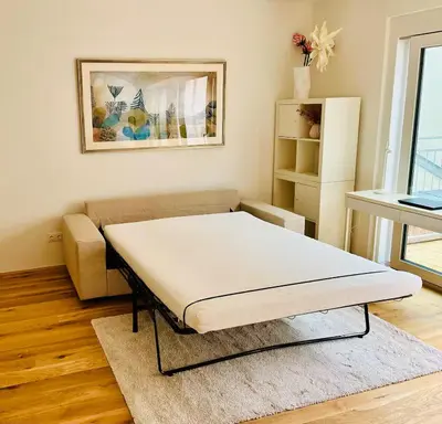 Ein Bett oder Betten in einem Zimmer der Unterkunft Stilvolle Premium-Wohnung mit Klimaanlage und Dachterrasse