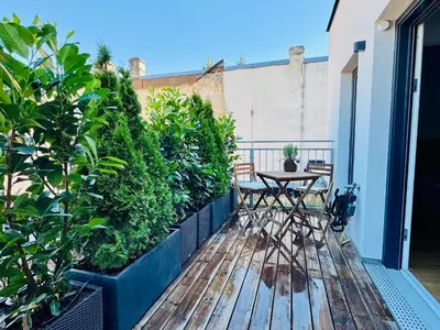 Ein Balkon oder eine Terrasse in der Unterkunft Stilvolle Premium-Wohnung mit Klimaanlage und Dachterrasse