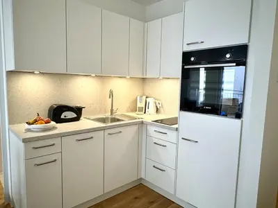 Küche/Küchenzeile in der Unterkunft Stilvolle Premium-Wohnung mit Klimaanlage und Dachterrasse