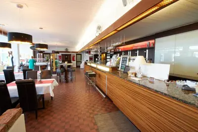 Ein Restaurant oder anderes Speiselokal in der Unterkunft Hotel & Restaurant Seehof