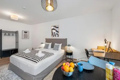 Ein Bett oder Betten in einem Zimmer der Unterkunft Vienna Hills Living