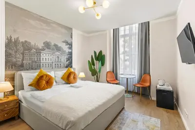 Ein Bett oder Betten in einem Zimmer der Unterkunft Votivpark Rooms I Self Check In