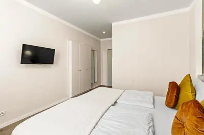 Ein Bett oder Betten in einem Zimmer der Unterkunft Votivpark Rooms I Self Check In