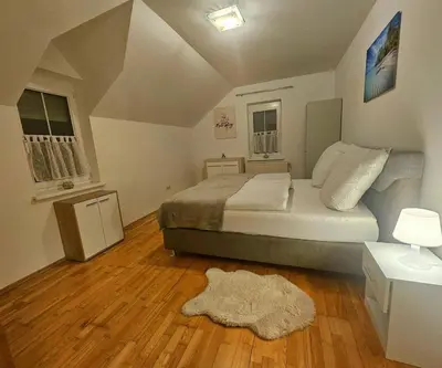 Ein Bett oder Betten in einem Zimmer der Unterkunft Idyllisches Ferienhaus Parndorf