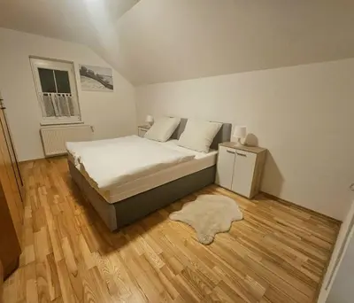 Ein Bett oder Betten in einem Zimmer der Unterkunft Idyllisches Ferienhaus Parndorf