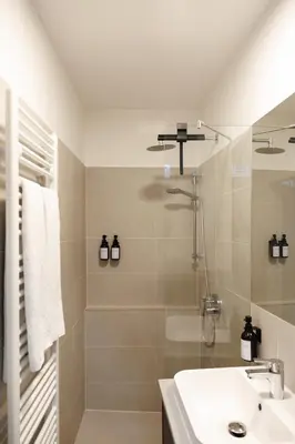 Ein Badezimmer in der Unterkunft Secret Garden Suite with Terrace, 10 min to Center