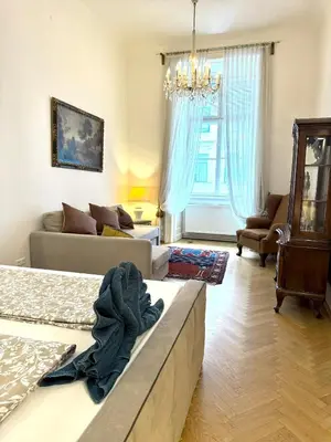 Ein Sitzbereich in der Unterkunft Historical Apartment In city center