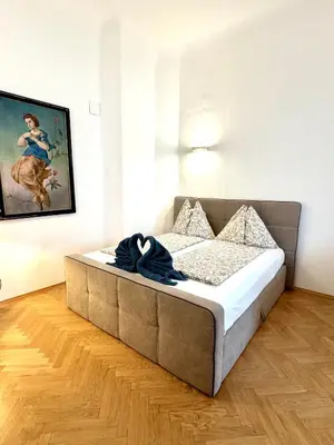 Ein Bett oder Betten in einem Zimmer der Unterkunft Historical Apartment In city center