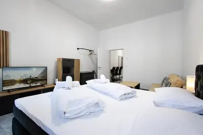 Ein Bett oder Betten in einem Zimmer der Unterkunft Vienna-Apartments Leopoldstadt