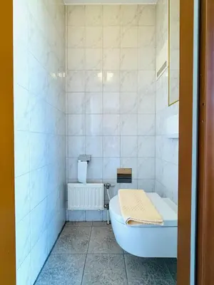 Ein Badezimmer in der Unterkunft E&C Pension Rooms