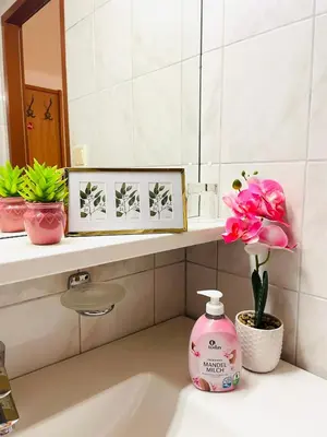 Ein Badezimmer in der Unterkunft E&C Pension Rooms