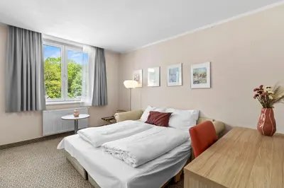 Ein Bett oder Betten in einem Zimmer der Unterkunft Schild Rooms - Self Check-in - Nature and Wine Area