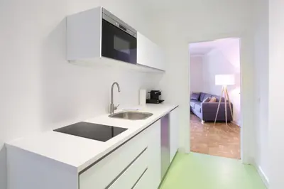 Küche/Küchenzeile in der Unterkunft Green Mango City Condo