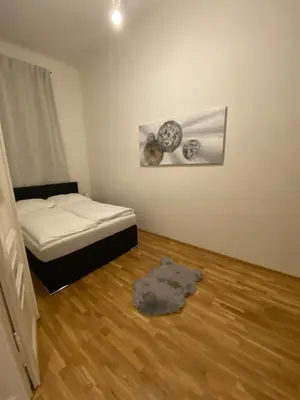 Ein Bett oder Betten in einem Zimmer der Unterkunft Stilvolles Wohnen Taborstraße
