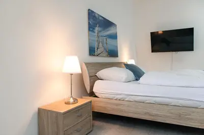Ein Bett oder Betten in einem Zimmer der Unterkunft Homely 3BR Apt Perfect for families and groups