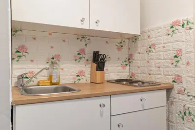 Küche/Küchenzeile in der Unterkunft Comfortable 2BR Apt Central & Well Connected