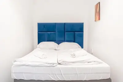Ein Bett oder Betten in einem Zimmer der Unterkunft Central Belvedere 3BR Shared Apartment - 12 min from City Center