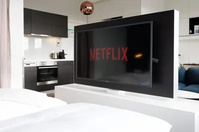 Ein Bett oder Betten in einem Zimmer der Unterkunft Penthouse-Flair with Skyline-View