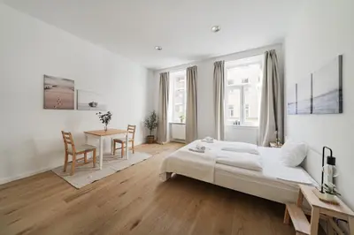 Ein Bett oder Betten in einem Zimmer der Unterkunft Smart Living Apartments - Favoriten