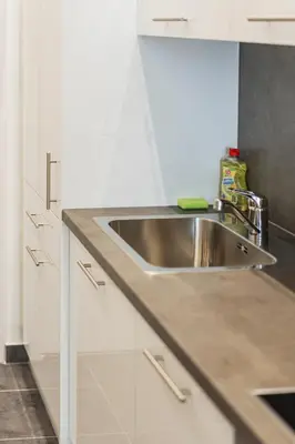 Küche/Küchenzeile in der Unterkunft Smart Living Apartments - Favoriten