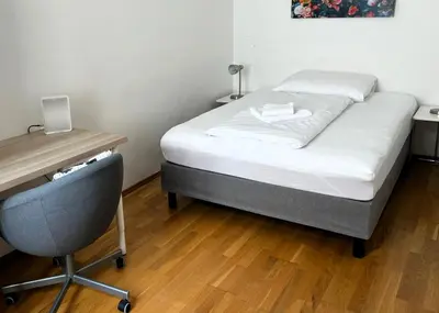 Ein Bett oder Betten in einem Zimmer der Unterkunft Casa Nostra - Helle Wohnung - direkt am Augarten