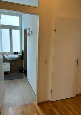Ein Bett oder Betten in einem Zimmer der Unterkunft Casa Nostra - Helle Wohnung - direkt am Augarten