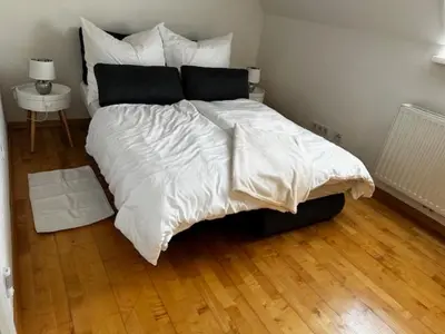 Ein Bett oder Betten in einem Zimmer der Unterkunft FERIEN DOMIZIL Neusiedlersee