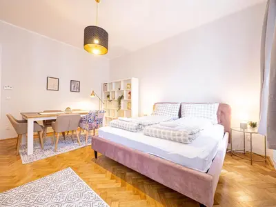 Ein Bett oder Betten in einem Zimmer der Unterkunft Shopping & Gourmet in Mariahilf
