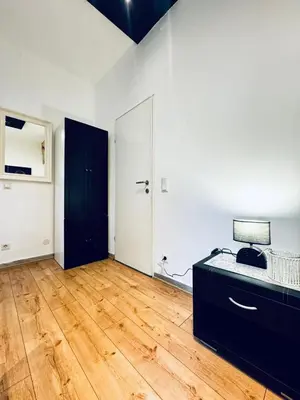 Ein Bett oder Betten in einem Zimmer der Unterkunft Studio for Two Close to Historic Rathausplatz
