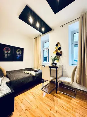 Ein Sitzbereich in der Unterkunft Studio for Two Close to Historic Rathausplatz