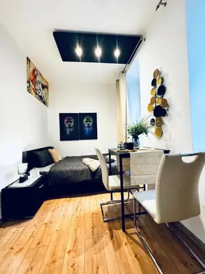 Ein Bett oder Betten in einem Zimmer der Unterkunft Studio for Two Close to Historic Rathausplatz
