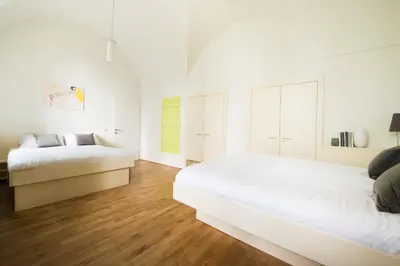 Ein Bett oder Betten in einem Zimmer der Unterkunft myNext - Johannesgasse Apartments