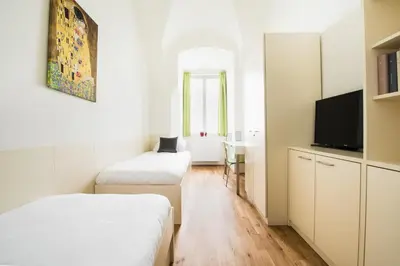 Ein Bett oder Betten in einem Zimmer der Unterkunft myNext - Johannesgasse Apartments