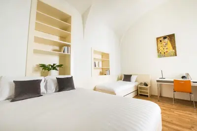 Ein Bett oder Betten in einem Zimmer der Unterkunft myNext - Johannesgasse Apartments