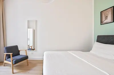 Ein Bett oder Betten in einem Zimmer der Unterkunft Central & Quiet 3rd District Walk all sights