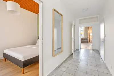 Ein Bett oder Betten in einem Zimmer der Unterkunft Central & Quiet 3rd District Walk all sights