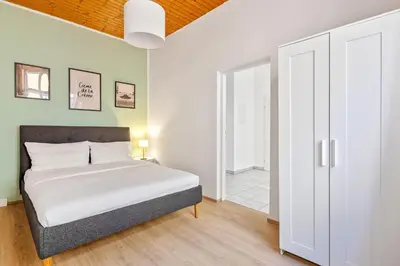 Ein Bett oder Betten in einem Zimmer der Unterkunft Central & Quiet 3rd District Walk all sights