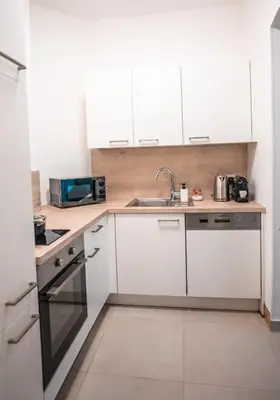Küche/Küchenzeile in der Unterkunft Erstklassige Designer Apartments