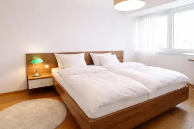 Ein Bett oder Betten in einem Zimmer der Unterkunft Modern rooftop APT Vienna