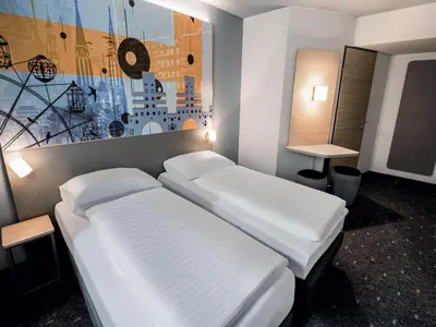 Ein Bett oder Betten in einem Zimmer der Unterkunft B&B HOTEL Wien-Heiligenstadt