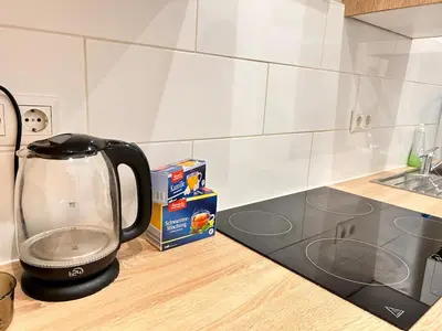 Küche/Küchenzeile in der Unterkunft Bright & Cozy Apartment in City Center Vienna 32