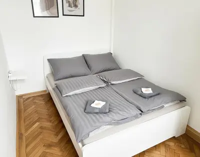Ein Bett oder Betten in einem Zimmer der Unterkunft Bright & Cozy Apartment in City Center Vienna 32