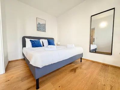 Ein Bett oder Betten in einem Zimmer der Unterkunft Hillside Living Vienna